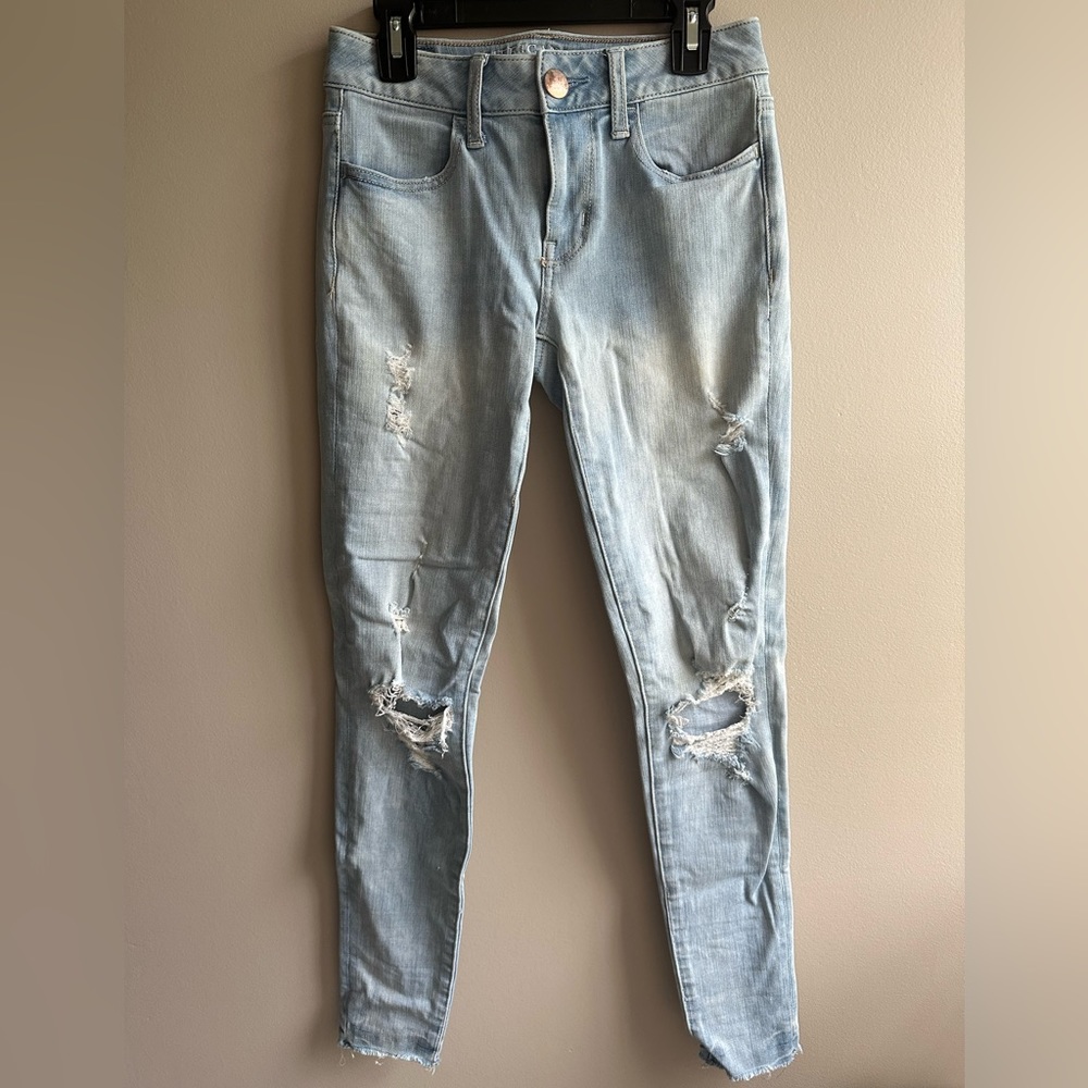 American Eagle, light wash, distressed ripped jeggings